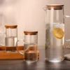 31014DUN1304-3 Set X 3 Jarras Vidrio Resistente Premium Tapa Bambu Otten Transparente